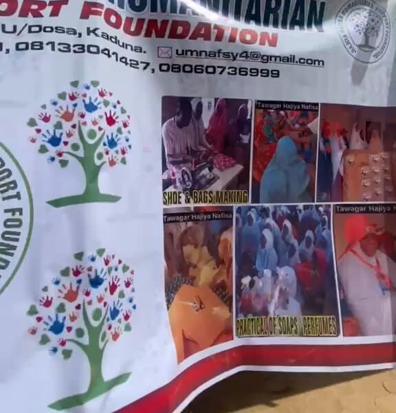 The foundation's banner showing photos of its tailoring, shoe-making, and soap-making training programmes